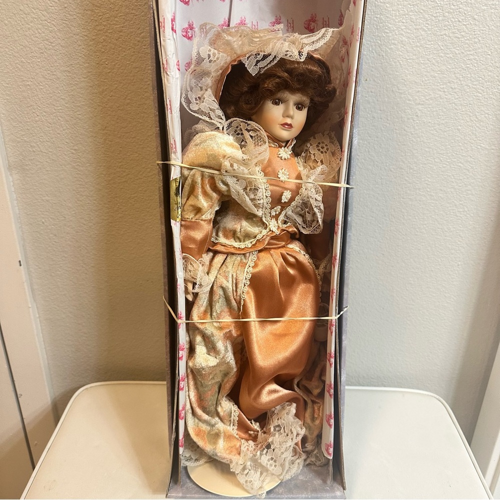 Elegant Porcelain Doll with Lace Dress
